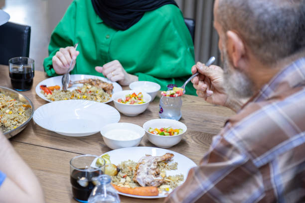 istock multi generation family eating together with grandfather 2007454865