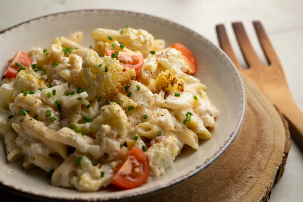Macaroni cooked with cream, cheese and baked cauliflower..