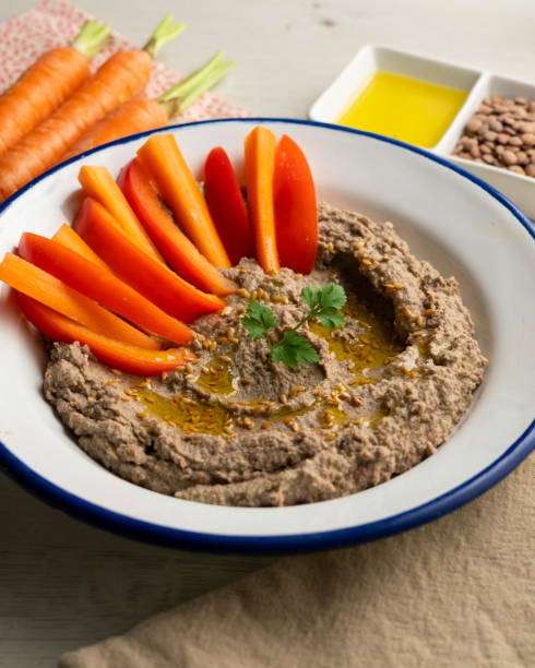 istock Lentil hummus served with carrot and red pepper. 2007490218