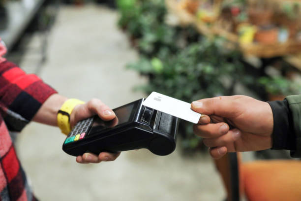 istock Contactless Payment Via Credit Card To POS Device 2007589061