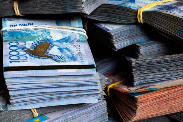 istock Kazakh Tenge money packs. KZT banknote bundle stacks. 2007589598