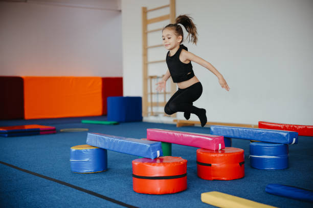 istock Happy girl during corrective gymnastics 2007595744