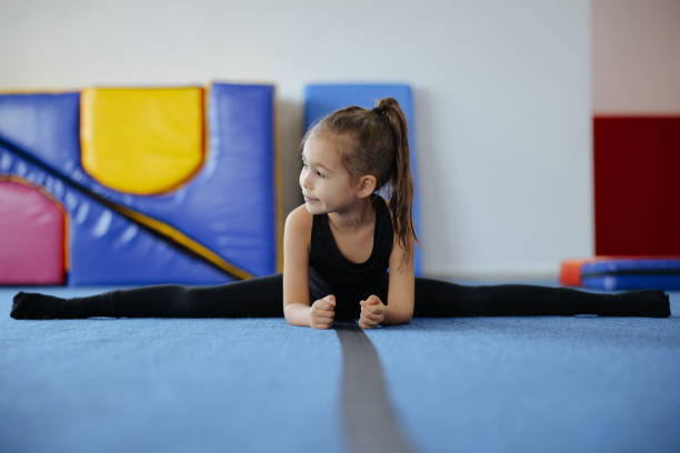 istock Happy girl during corrective gymnastics 2007597101