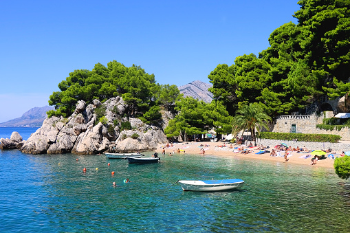 Brela, Croatia - September 3, 2023: Summer day on the beautiful beach in Brela, Croatia.