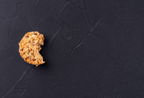 istock Bite off granola cookies made from cereals and grains 2007653044