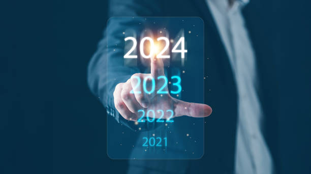 istock Businessman hand touch virtual screen technology digital calendar countdown to new year 2024, Business success and growth Corporate investment in the future concept. 2007694963