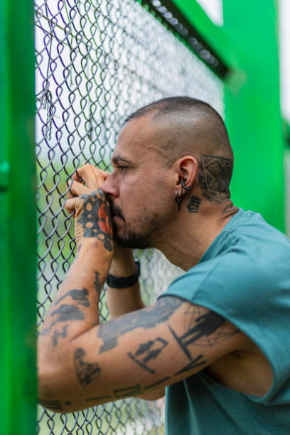 istock Latino man exercises outdoors while watching a soccer game 2007704324