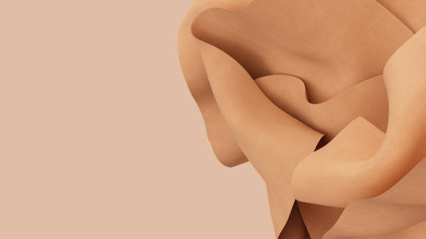 istock Abstract wavy beige tender fabric motion in wind. peach color satin cloth soft crumple. 3d render illustration 2007708609