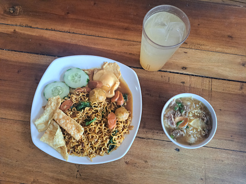 Delicious Nyemek Fried Noodles Or Mie Nyemek And Soto Daging Sapi With Lime Iced. Mi Nyemek Goreng Dan Es Jeruk Nipis. Food And Drink Menu.