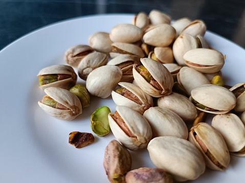 A healthy and delicious snack, pistachios are a good source of protein, fiber, and vitamins.