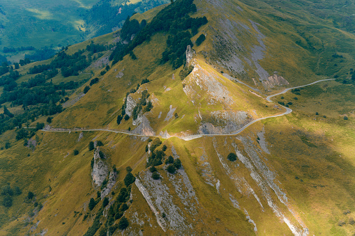 Mountain road rounds the bend on the steep climb in the Pyrenean mountains