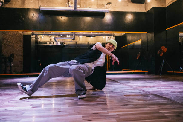 istock Japanese man practising breakdance moves in a dance studio 2007850168