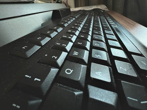 istock A side angle view of a computer keyboard in my home office that I use when I am working from home 2007862453