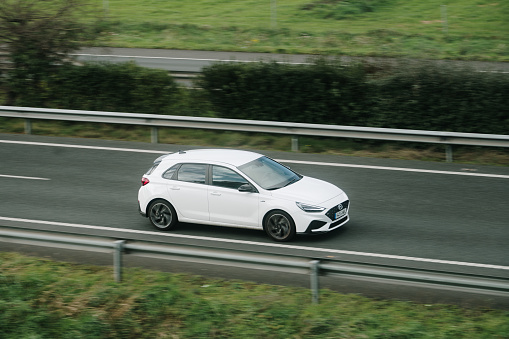 Santander, Spain - 12 February 2024: A Hyundai i30 in motion on a highway