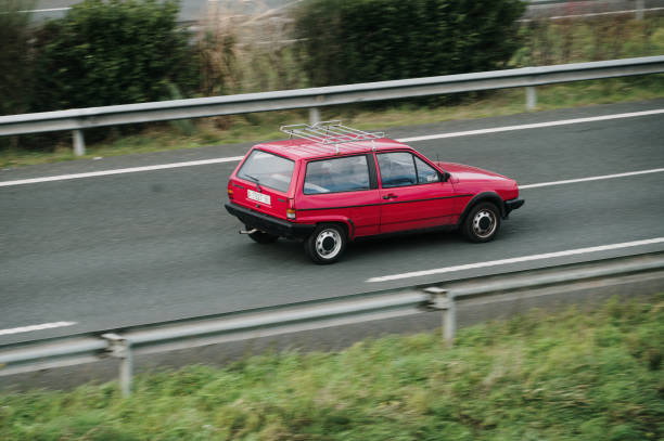 Moscow. Russia - May 20, 2019: White tuned in Stance style Volkswagen Golf mk 1. Low car with wide red wheels parked on the street. Cult and legendary