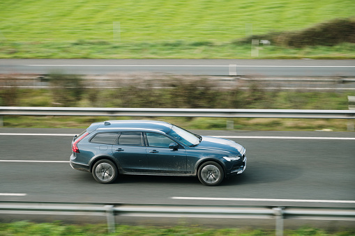 Santander, Spain - 12 February 2024: A Volvo V90 Cross Country in motion on a highway