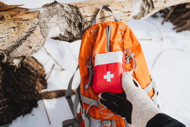istock First Aid Kit in the Snow for Emergencies While Backpacking in the Wilderness 2007866318