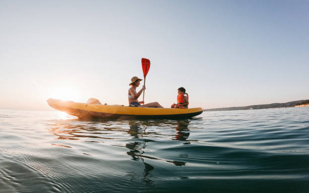 istock Mother and son kayaking together 2007883442