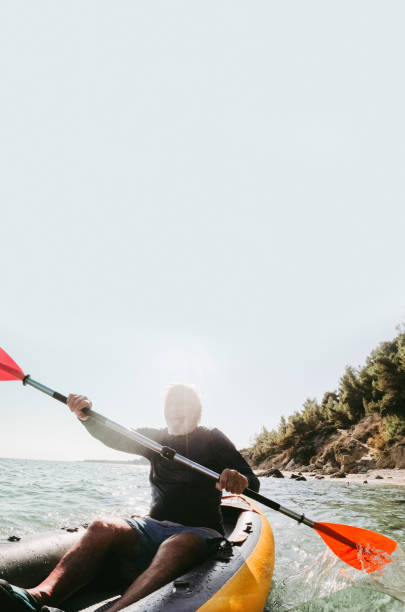 istock Senior man riding a kayak 2007883454