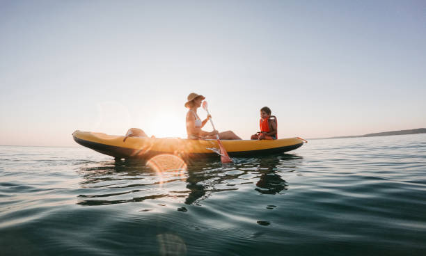 istock Mother and son kayaking together 2007883459