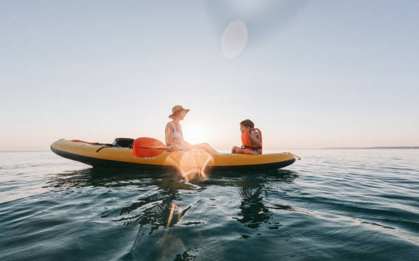 istock Mother and son kayaking together 2007883471