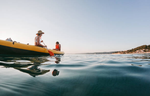 istock Mother and son kayaking together 2007883479