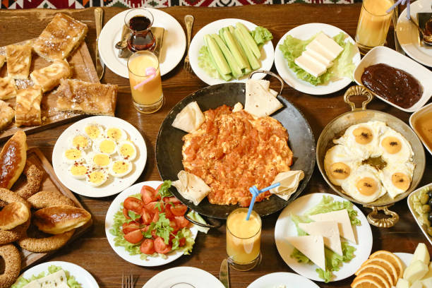 istock A spread of food and drinks on a table with plates and dishes for sharing 2007898346