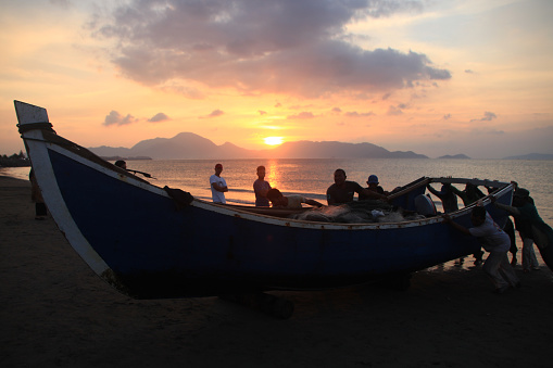 Banda Aceh, 12/14/2019, he people of the coastal city of Banda Aceh enjoy the beauty of the Javanese village beach at sunset. Banda Aceh-Indonesia