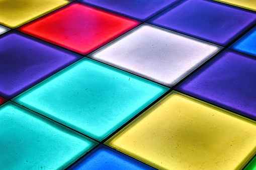 Colorful translucent tiles with lights beneath.