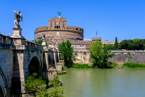 Rome, IT - 11 August 2023: Castel Sant'Angelo and Tiber River