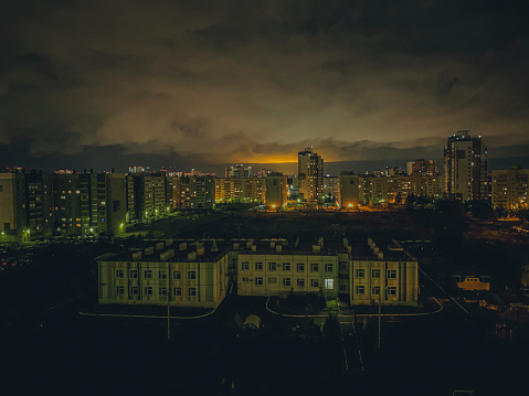 Night view of the city. Houses and streets of the city.