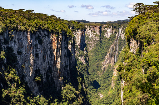 Waterfall, Forest, river and cliffs in Itaimbezinho Canyon, Cambara do Sul, Rio Grande do Sul, Brazil