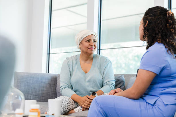 istock Unrecognizable female nurse bonds with her patient 2008011095