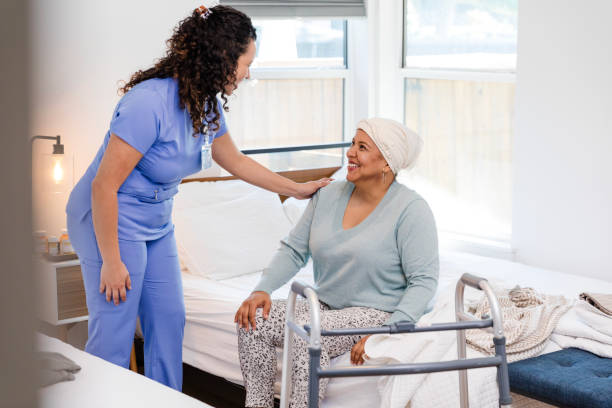 istock Female physical therapist greets her female patient 2008011640