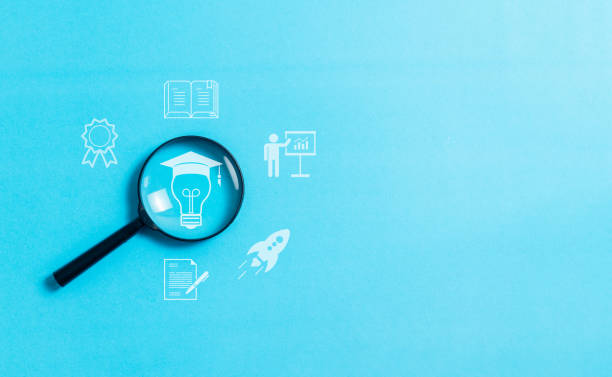istock Magnifying glass focus to online education concept on blue background, E-learning education, internet lessons and online webinar. 2008041755