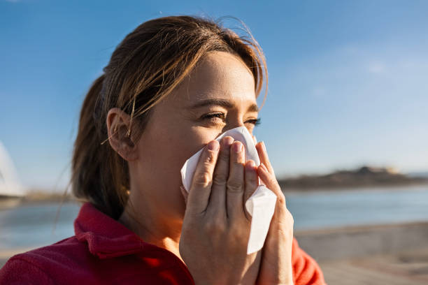 istock Sportswoman Takes a Break for a Sneeze 2008042288
