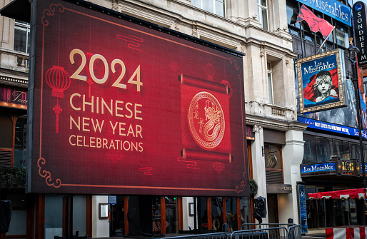 London. UK- 02.11.2024. A billboard sign for the Chinese New Year Celebration on Shaftesbury Avenue with West End theatre in the background.