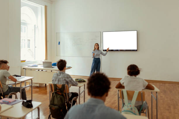istock Female Teacher Giving Lecture to School Students 2008055275