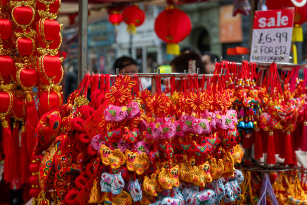 London. UK- 02.11.2024. Beautiful, colourful, ornate Chinese New Year ornaments and decoration on display on a street stall during the new year celebration.