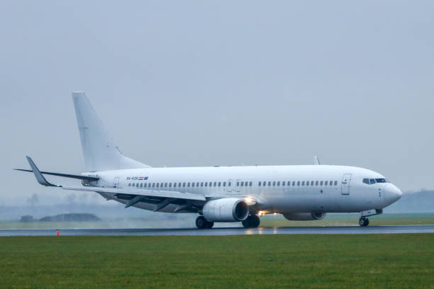 Boeing 737 9A-KOR lands on the Polderbaan in Amsterdam in the Netherlands