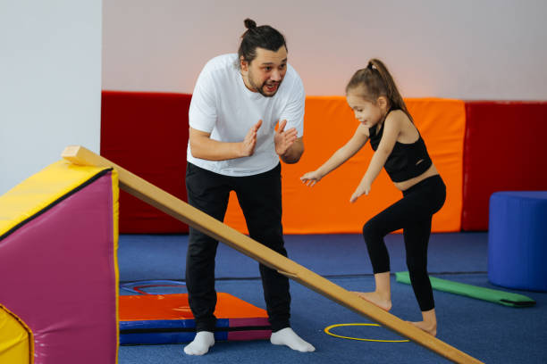 istock Happy girl during corrective gymnastics 2008134177