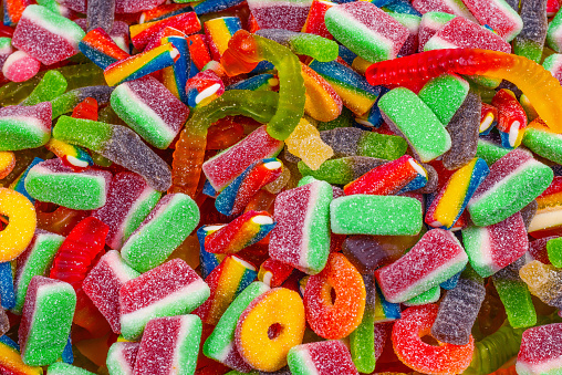 Assorted tasty gummy candies. Top view. Jelly  sweets background.