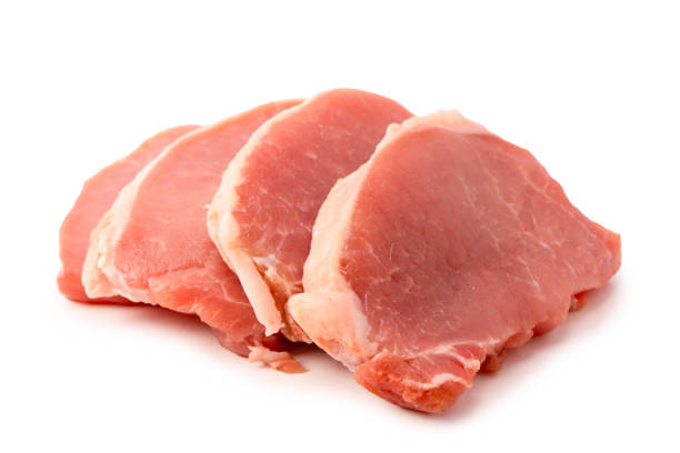 istock Raw pork pieces isolated on a white background. 2008215726