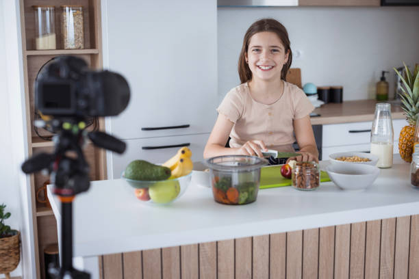 istock Young influencer making a video about food 2008220117