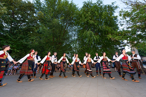 Loznica, Serbia - July 11, 2023: A national festival with a regional folk authentic tradition. Serbian National Folklore dancing Kolo.