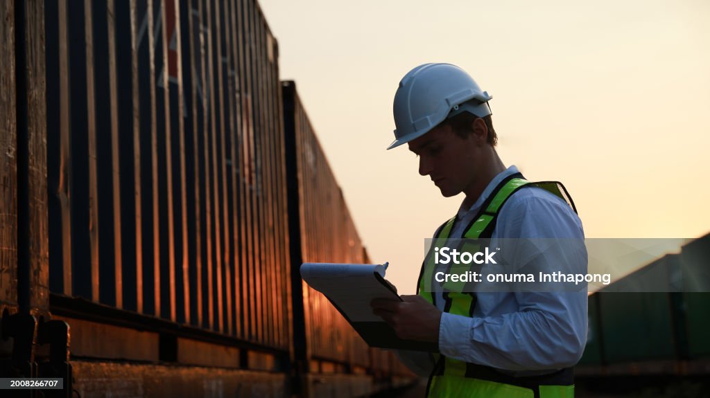 Logistic Engineer Work On Container Cargo By Train Freight Ship Import ...