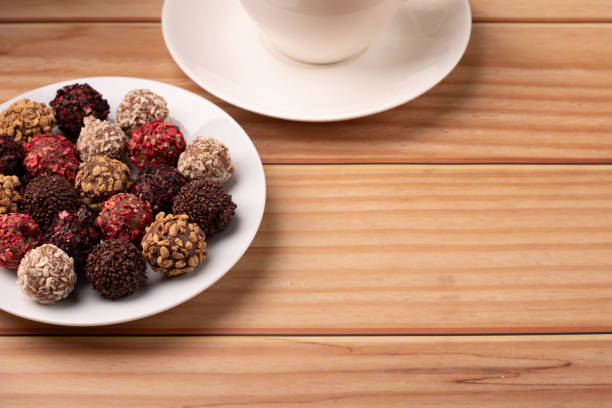 candy, dessert, cup, coffee, food, mixed, sweet, chocolate, truffle, copy space, brown, dark, caffeine, aroma, hot, milk, drink, background, cafe, kitchen, object, choice, sugar, love