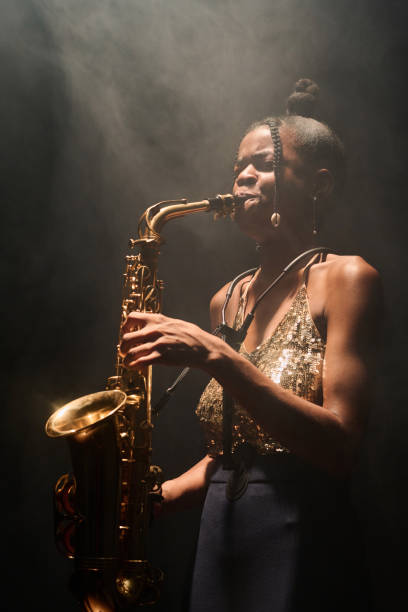 istock Woman playing saxophone jazz 2008322242