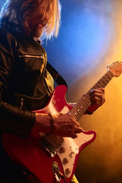 istock Rock Musician Playing Electric Guitar 2008322845