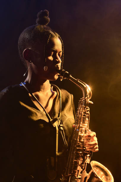 istock Young Woman Playing Saxophone Music 2008323355